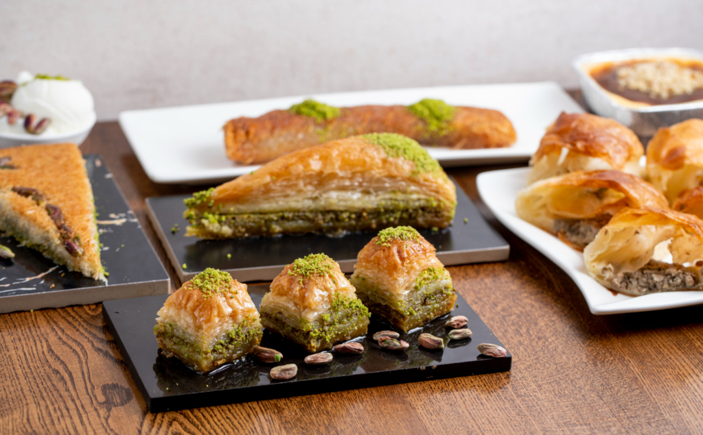 ssortment of Turkish desserts including Baklava, Turkish Delight, and Sütlaç